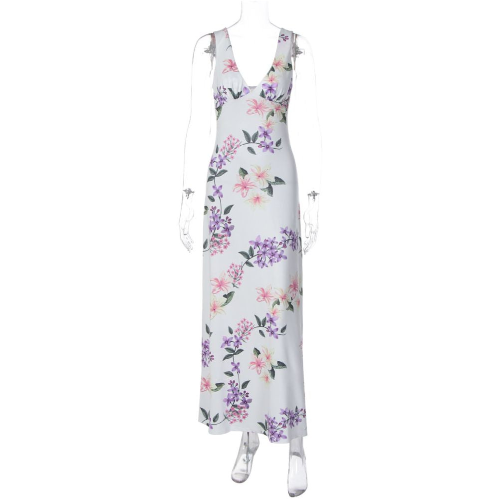 Shemoda French vacation style floral V neck camisole dress with a feminine feel featuring a backless high waisted slim fit and knee length skirt