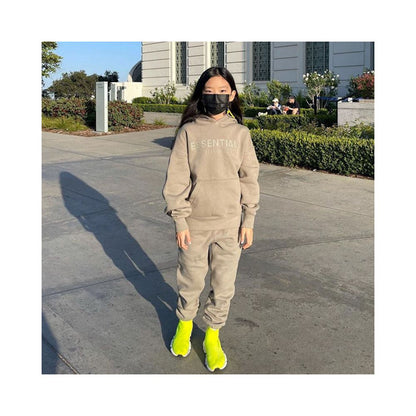 Fashion brand children s clothing ESSENTIALS letter autumn and winter clothing European and American men s and women s loose hooded and velvet sweatshirt set