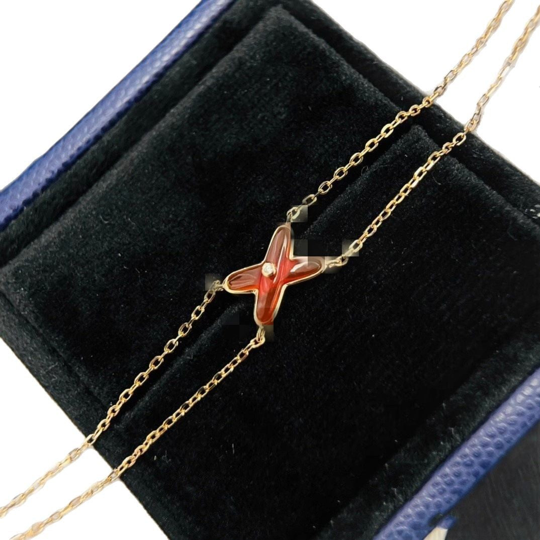 High version cross X bracelet female white fritillary with diamond letter chain plated 18k rose gold personality Joker factory wholesale
