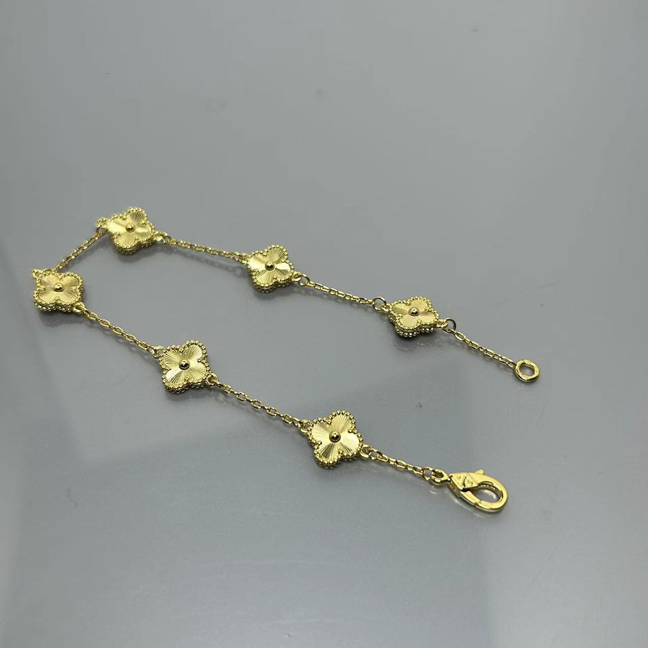 Four-leaf clover mini six-flower bracelet women's high version V gold full diamond bracelet does not fade summer silver bracelet high sense
