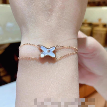High version cross X bracelet female white fritillary with diamond letter chain plated 18k rose gold personality Joker factory wholesale