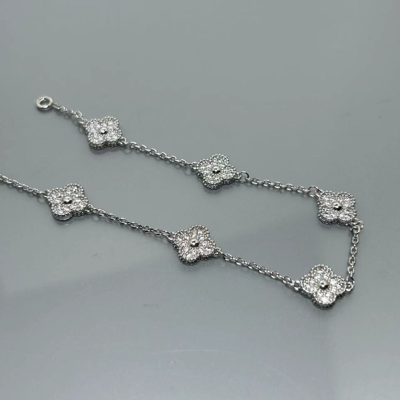 Four-leaf clover mini six-flower bracelet women's high version V gold full diamond bracelet does not fade summer silver bracelet high sense