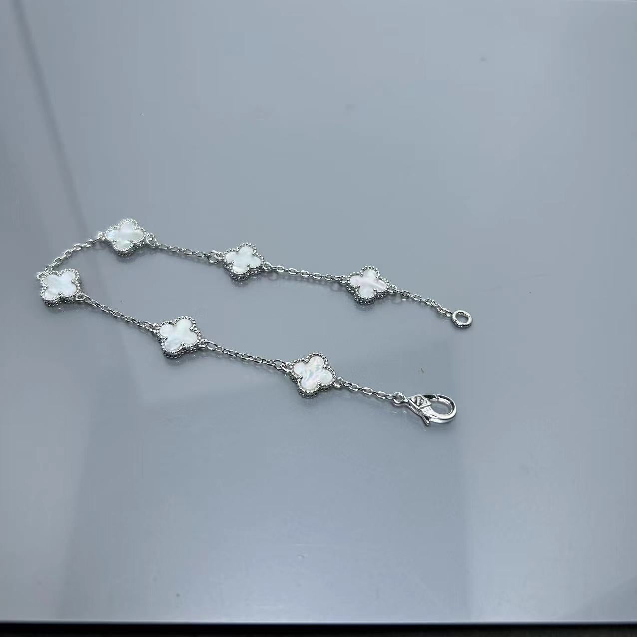 Four-leaf clover mini six-flower bracelet women's high version V gold full diamond bracelet does not fade summer silver bracelet high sense