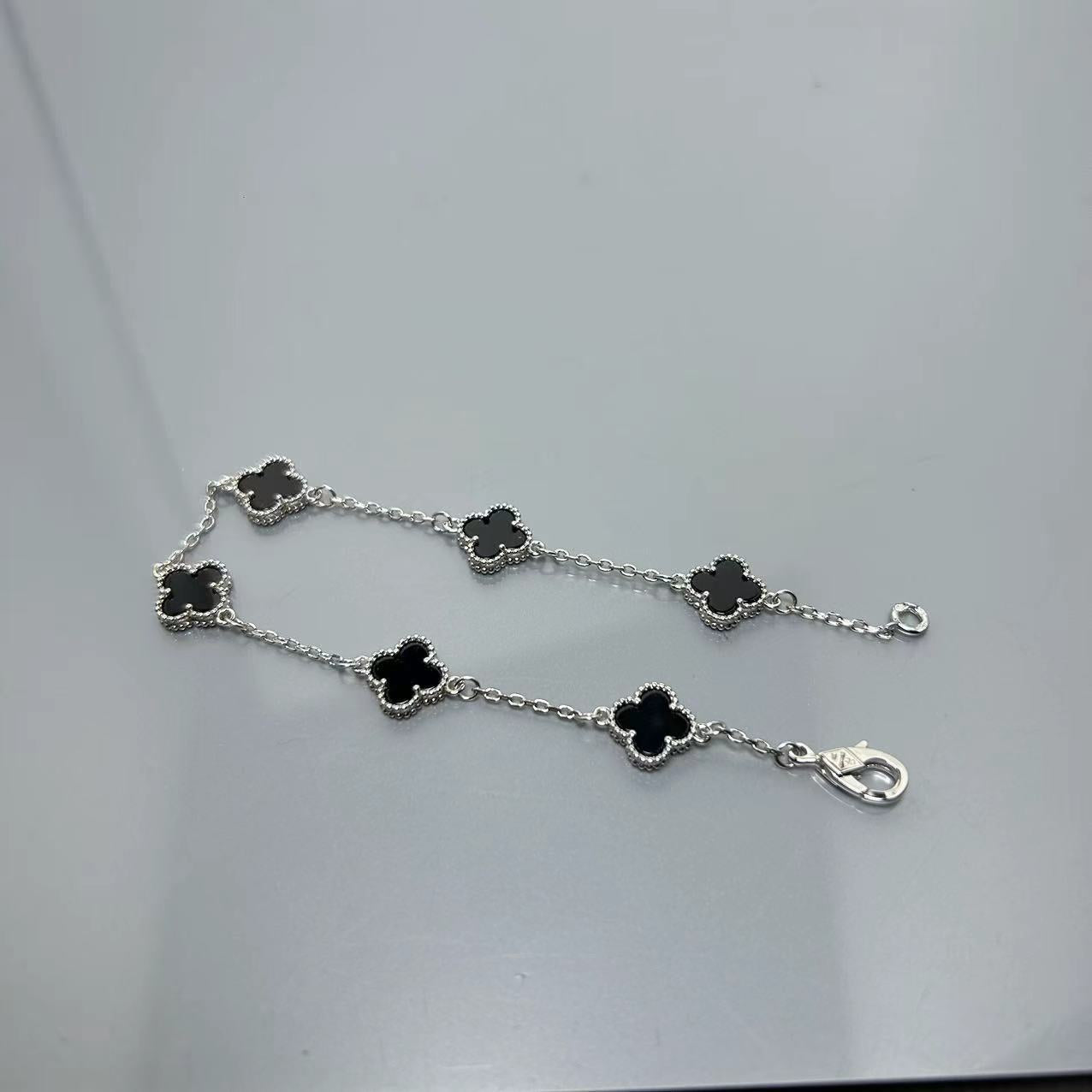 Four-leaf clover mini six-flower bracelet women's high version V gold full diamond bracelet does not fade summer silver bracelet high sense