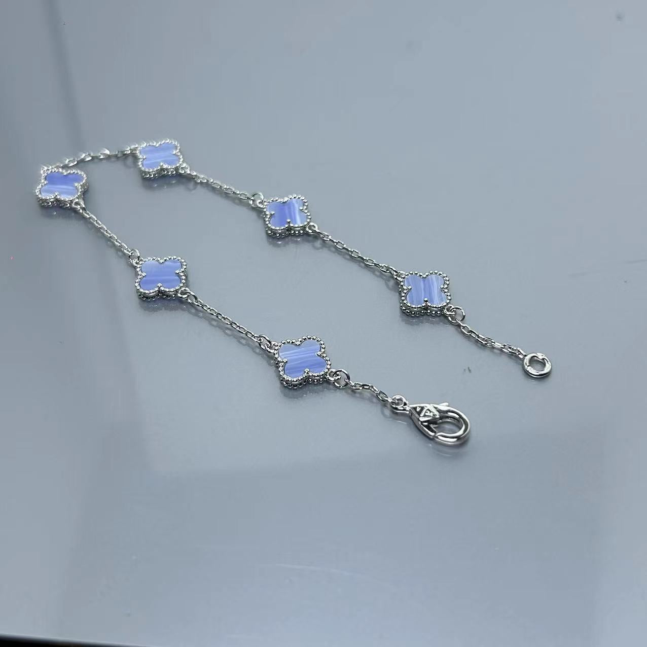 Four-leaf clover mini six-flower bracelet women's high version V gold full diamond bracelet does not fade summer silver bracelet high sense